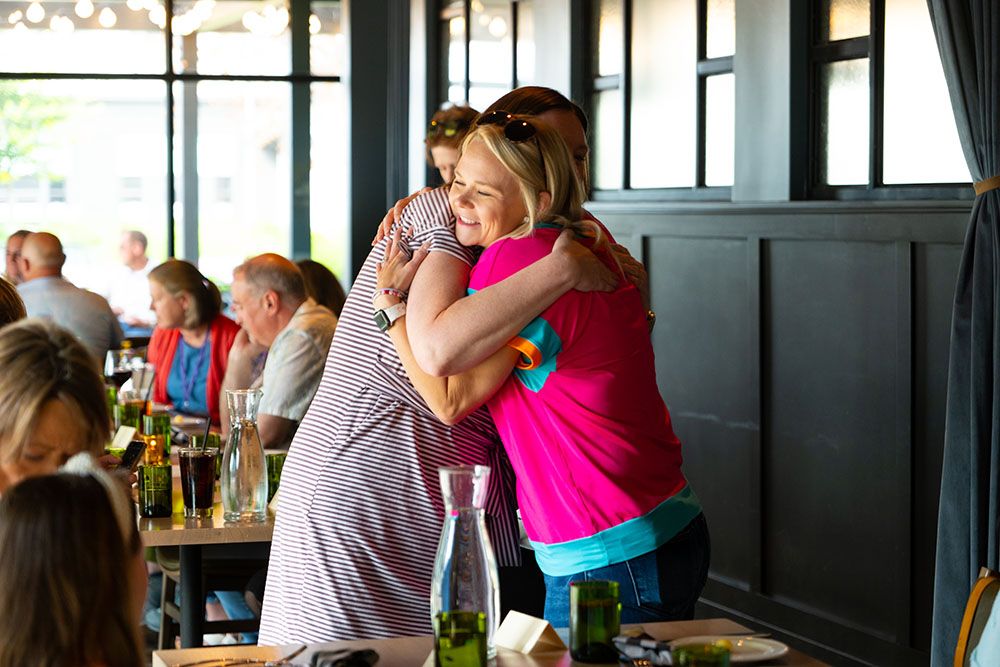 women hugging